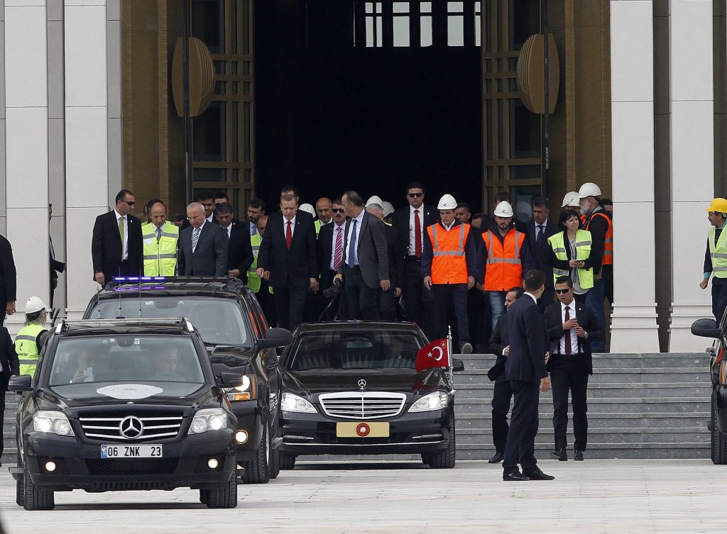 ANKARA, TURKEY - OCTOBER 16: Turkish President Recep Tayyip Erdogan (front L) visits the construction of new presidential palace built inside Ataturk Forest Farm in Ankara, Turkey on October 16, 2014. (Mehmet Ali Ozcan/Anadolu Agency)